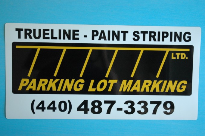 White, Black, and Yellow Signage